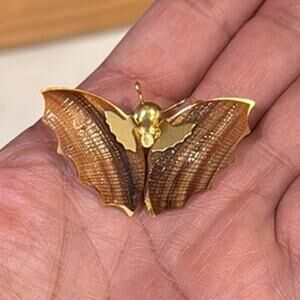 Vintage butterfly pin brooch ridged shell-like, wings gold-toned body statement